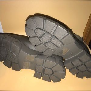 olive green platform chelsea style lug sole water proof boots.